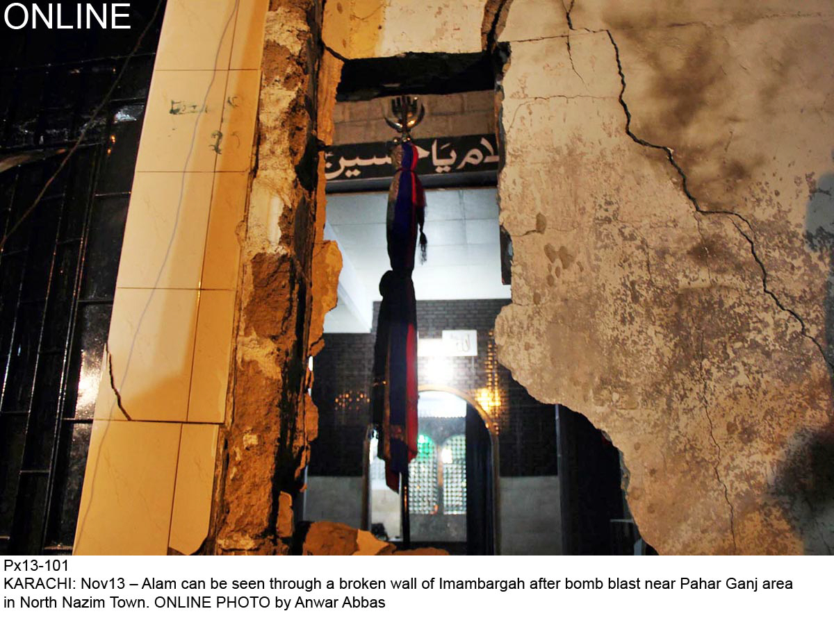a view of the damaged wall of an imambargah near pahar ganj in karachi on wednesday evening photo online