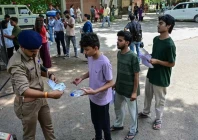 india holds re exam under tight security following leak