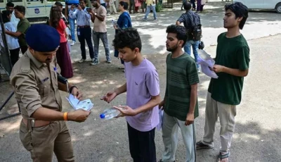 india holds re exam under tight security following leak india holds re exam under tight security following leak