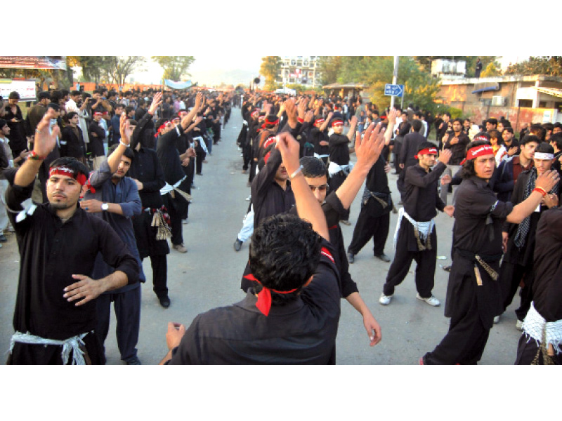 every year mourners from the capital as well as neighbouring areas gathered at the g 6 imambargah for the 9th muharram procession residents can be seen helping providing drinks to the marchers photo muhammad javaid amp myra iqbal express