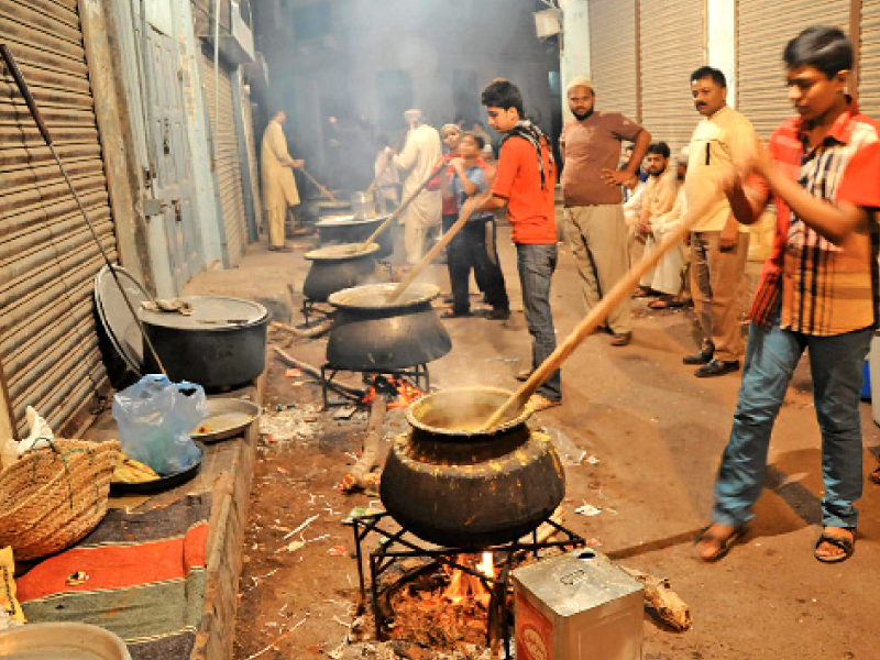 the male members of communities in karachi prepare haleem on ashura friends family and neighbours contribute money and then get the cooked meal the next day on muharram 10 photo mohammad noman express
