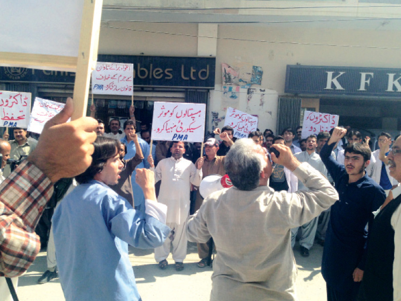 doctors protesting against kidnapping lack of security in hospitals and failure of the government to recover the abducted doctors photo express tribune