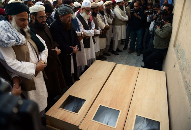 maulana samiul haq 3l leads funeral prayers for sectarian violence victims in rawalpindi on november 17 2013 photo afp