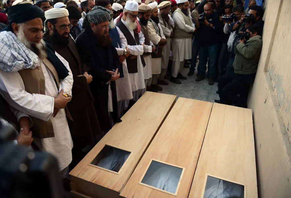 maulana samiul haq 3l leads funeral prayers for sectarian violence victims in rawalpindi on november 17 2013 photo afp maulana samiul haq 3l leads funeral prayers for sectarian violence victims in rawalpindi on november 17 2013 photo afp