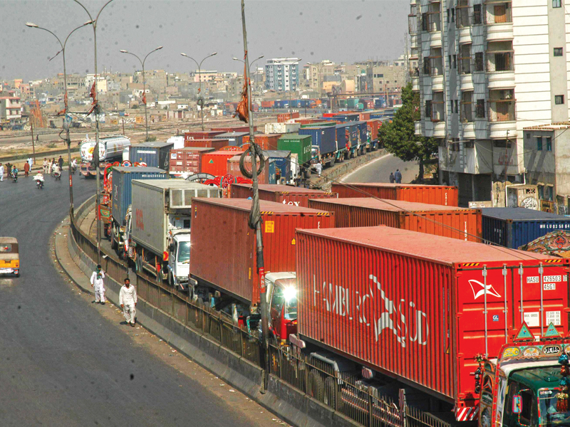 trucks laden with containers caught in a massive gridlock on mauripur road after the goods transporters called off the strike photo rashid ajmeri express