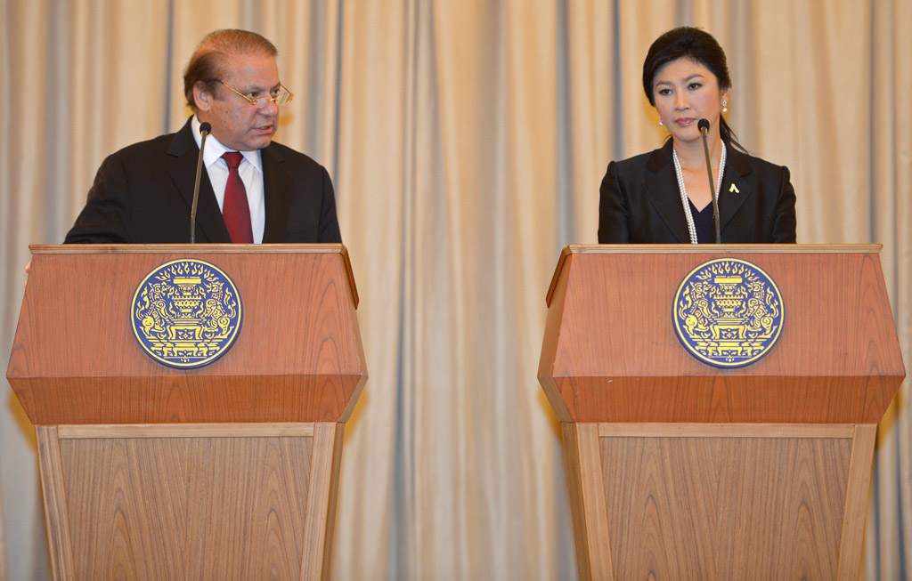 pakistani prime minister nawaz sharif l speaks next to thai prime minister yingluck shinawatra r during a press conference at government house in bangkok on november 18 2013 sharif is on three day visit to thailand photo afp