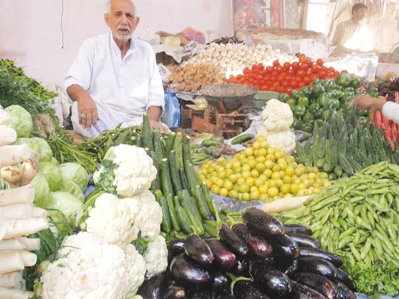 haji hanif kamboh above a vegetable vendor believes the government is supplying potatoes and onions to other countries photo express haji hanif kamboh above a vegetable vendor believes the government is supplying potatoes and onions to other countries photo express