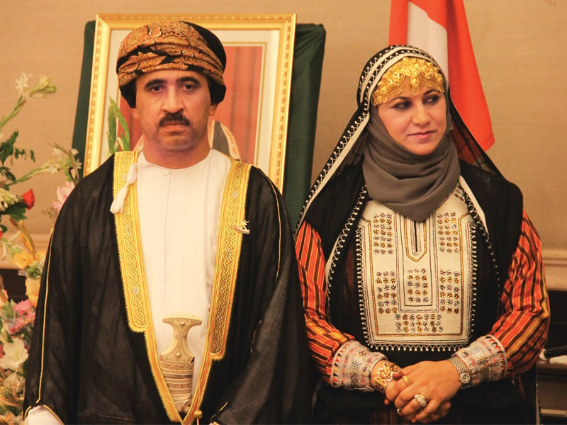 oman consul general ali ahmed alqassimi and his wife wore their national dress called dishdasha at a ceremony to celebrate oman s 43rd national day photo ayesha mir express