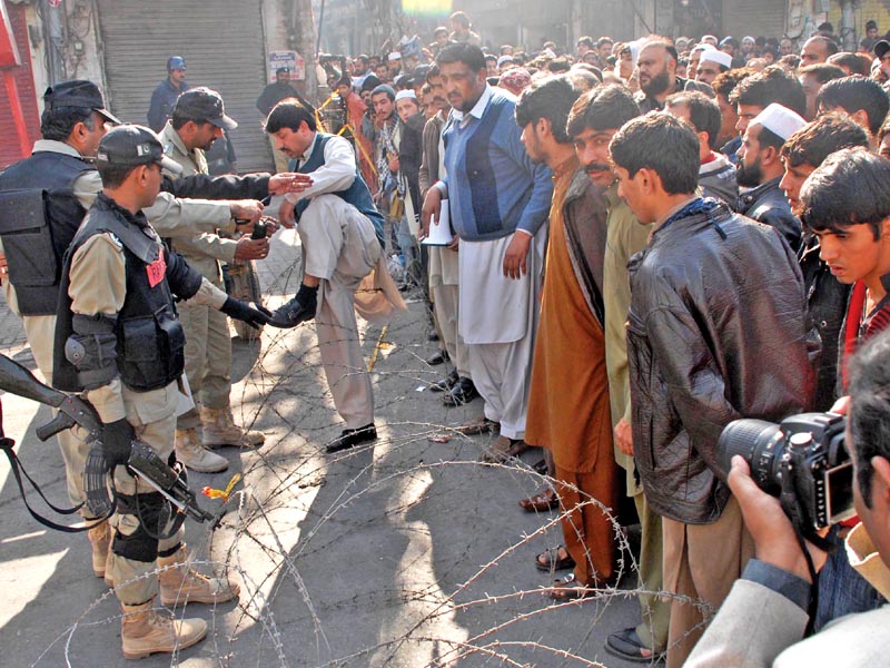 rangers stop traders from visiting their burnt shops photo muhammad javaid express