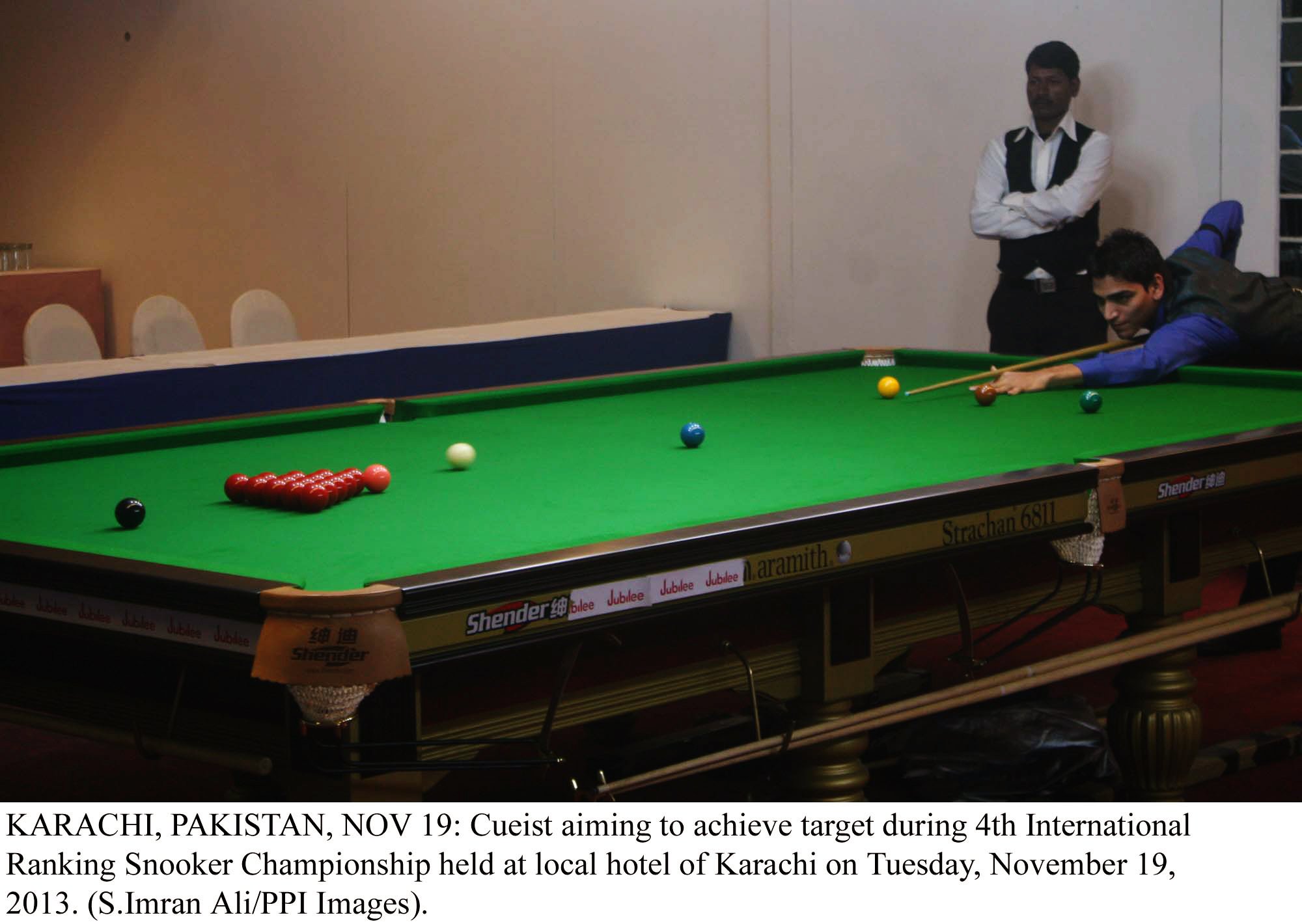 a cueist strikes during the 4th international ranking snooker championship in karachi on tuesday photo ppi