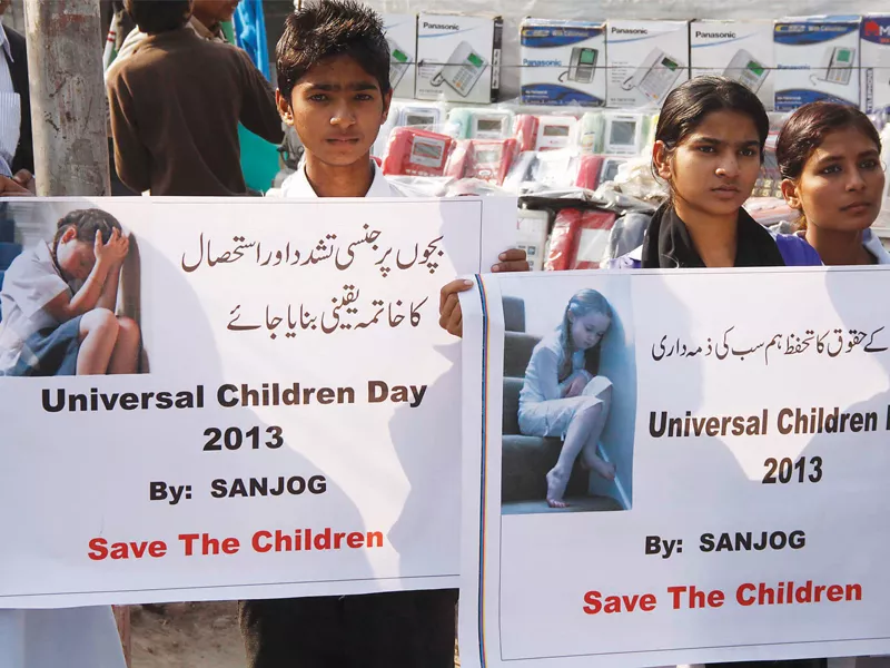 children hold placards at a demonstration outside the lahore press club on thursday photo shafiq malik express children hold placards at a demonstration outside the lahore press club on thursday photo shafiq malik express