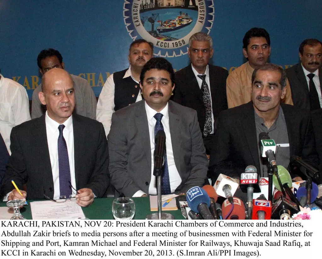 president kcci abdullah zakir l along with federal minister for ports and shipping kamran michael c and federal minister for railways khawaja saad rafiq at a press briefing in karachi photo ppi president kcci abdullah zakir l along with federal minister for ports and shipping kamran michael c and federal minister for railways khawaja saad rafiq at a press briefing in karachi photo ppi