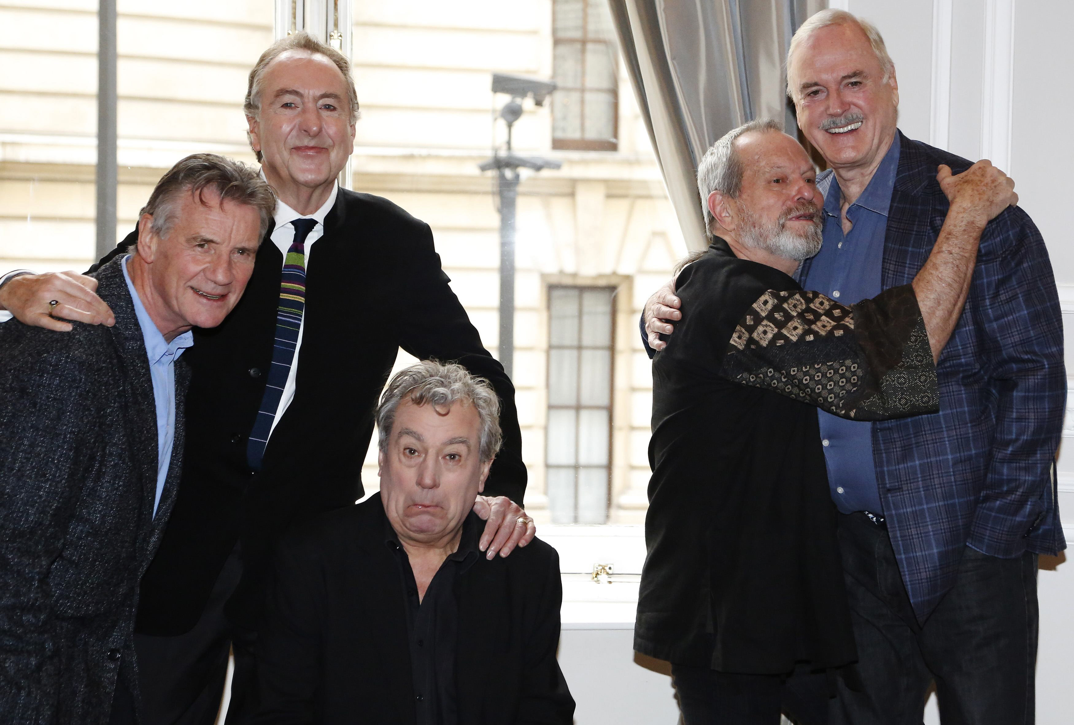 the surviving members of the original cast of the monty python comedy team l r michael palin eric idle terry jones terry gilliam and john cleese pose for photographers at a photocall in central london november 21 2013 photo reuters