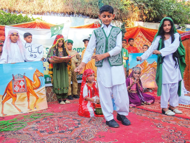 young residents of pakistan sweet home in sukkur decked up in colourful clothes and presented tableaus on the occasion of the universal children s day on wednesday photo express