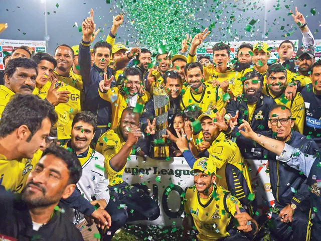 jubilant peshawar zalmi players pose with the psl trophy in lahore photo afp jubilant peshawar zalmi players pose with the psl trophy in lahore photo afp