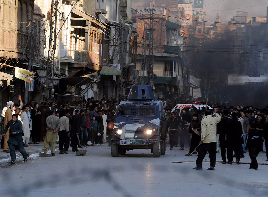 the mob during rawalpindi clashes photo afp the mob during rawalpindi clashes photo afp