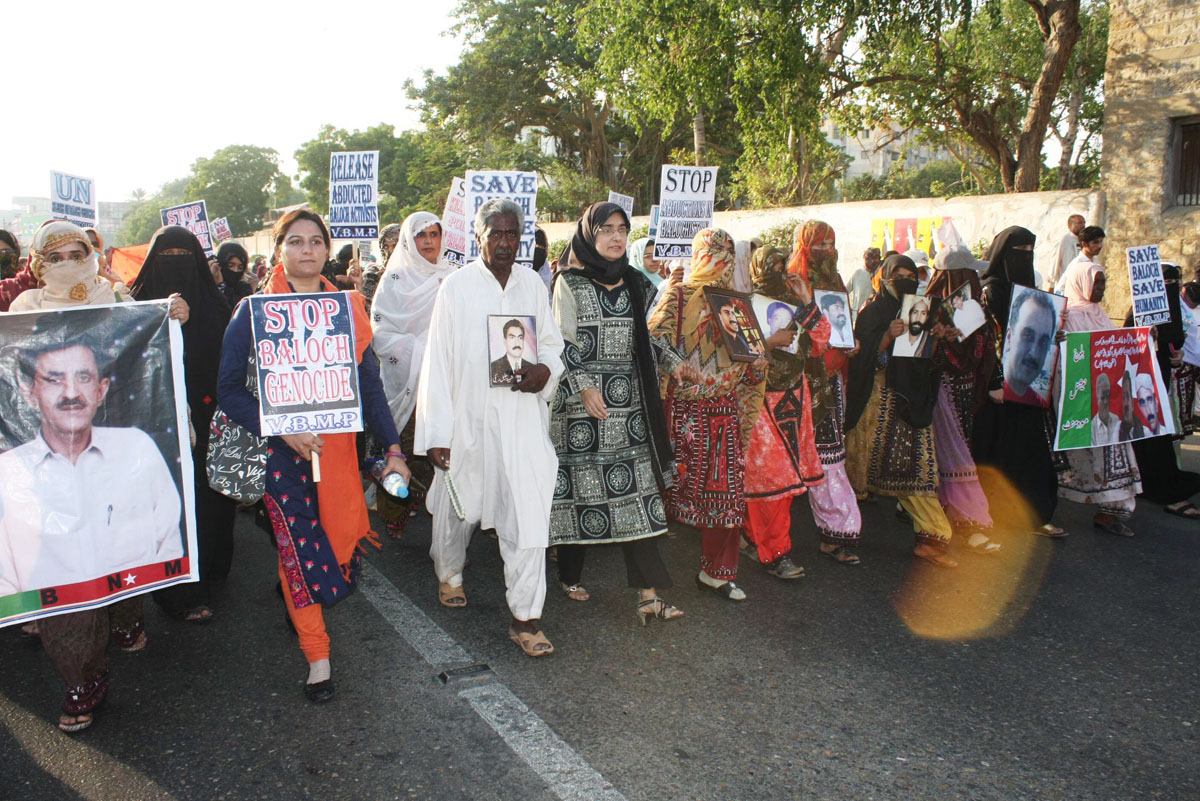 baloch protesters who have walked 700 kilometers to karachi on their final leg near the karachi press club on friday photo mohammad saqib express