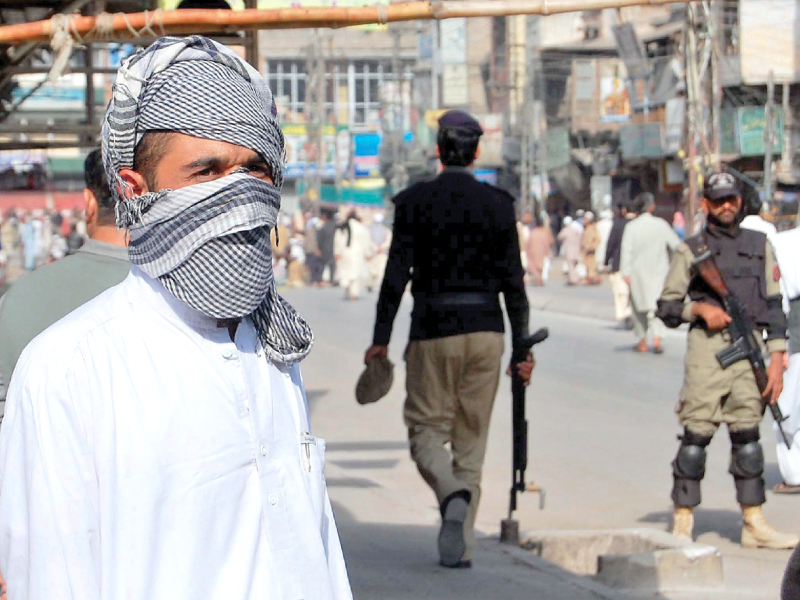 a man is seen during the rally in rawalpindi photo muhammad javaid express