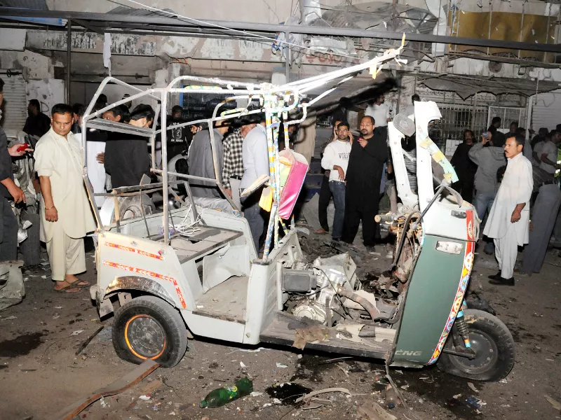 people gather at the site of twin blasts in ancholi area of karachi photo muhammad noman express people gather at the site of twin blasts in ancholi area of karachi photo muhammad noman express