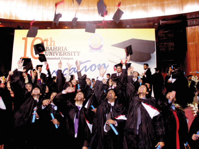 graduates celebrate after receiving their degrees photo express