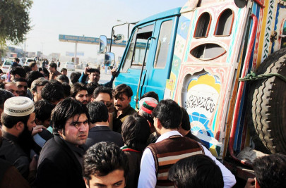 pti dharna protesters harass truck drivers in k p