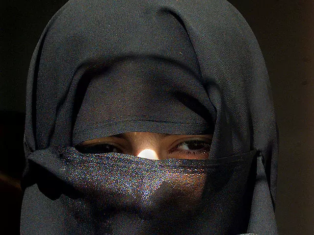 residents say to enter government offices banks or courts women had to remove veils and men shave their beards photo reuters file residents say to enter government offices banks or courts women had to remove veils and men shave their beards photo reuters file