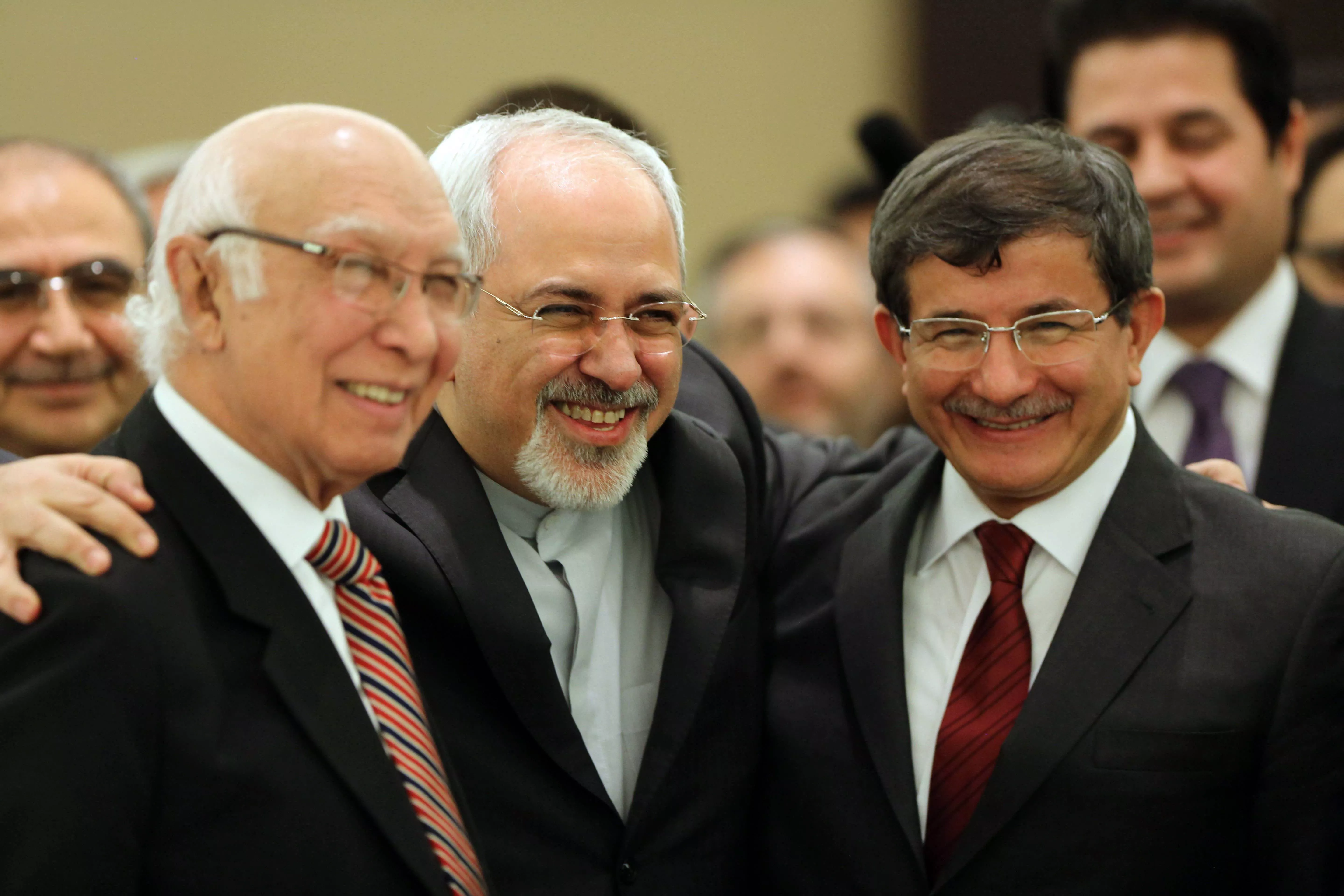 iranian foreign minister mohammad javad zarif c poses for a picture with his counterparts from pakistan sartaj aziz l and turkey ahmet davutoglu during the opening session of a two day ministerial conference of the economic cooperation organisation eco which groups 10 asian and eurasian countries in tehran on november 26 2013 photo afp iranian foreign minister mohammad javad zarif c poses for a picture with his counterparts from pakistan sartaj aziz l and turkey ahmet davutoglu during the opening session of a two day ministerial conference of the economic cooperation organisation eco which groups 10 asian and eurasian countries in tehran on november 26 2013 photo afp