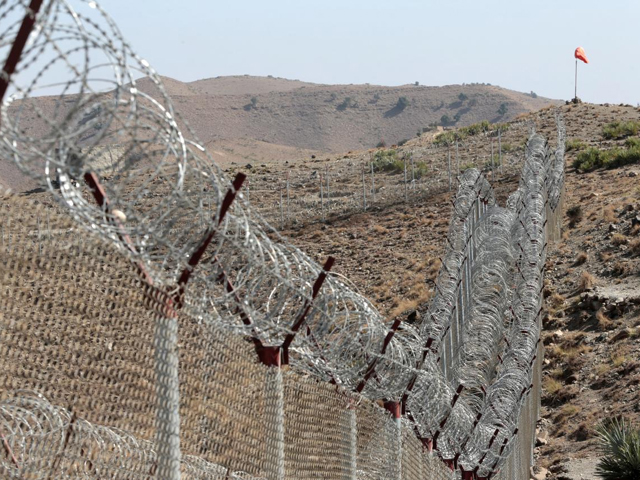 A view of the border fence outside the Kitton outpost on the border with Afghanistan in North Waziristan, Pakistan October 18, 2017. PHOTO: REUTERS