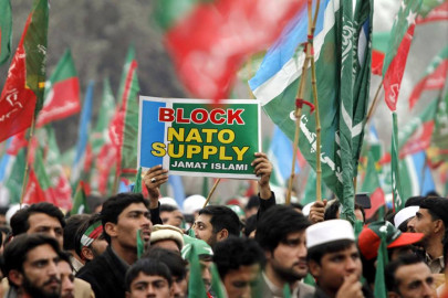 police arrest pti worker for damaging nato containers