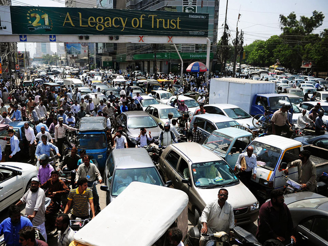 pakistani commuters stuck in a traffic jam in karachi on june 3 2014 photo afp