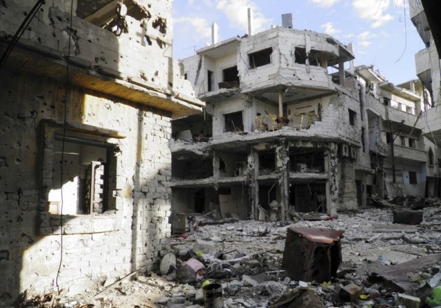 a sitting room top c lies in a damaged house inside the besieged area of homs november 28 2013 photo reuters a sitting room top c lies in a damaged house inside the besieged area of homs november 28 2013 photo reuters