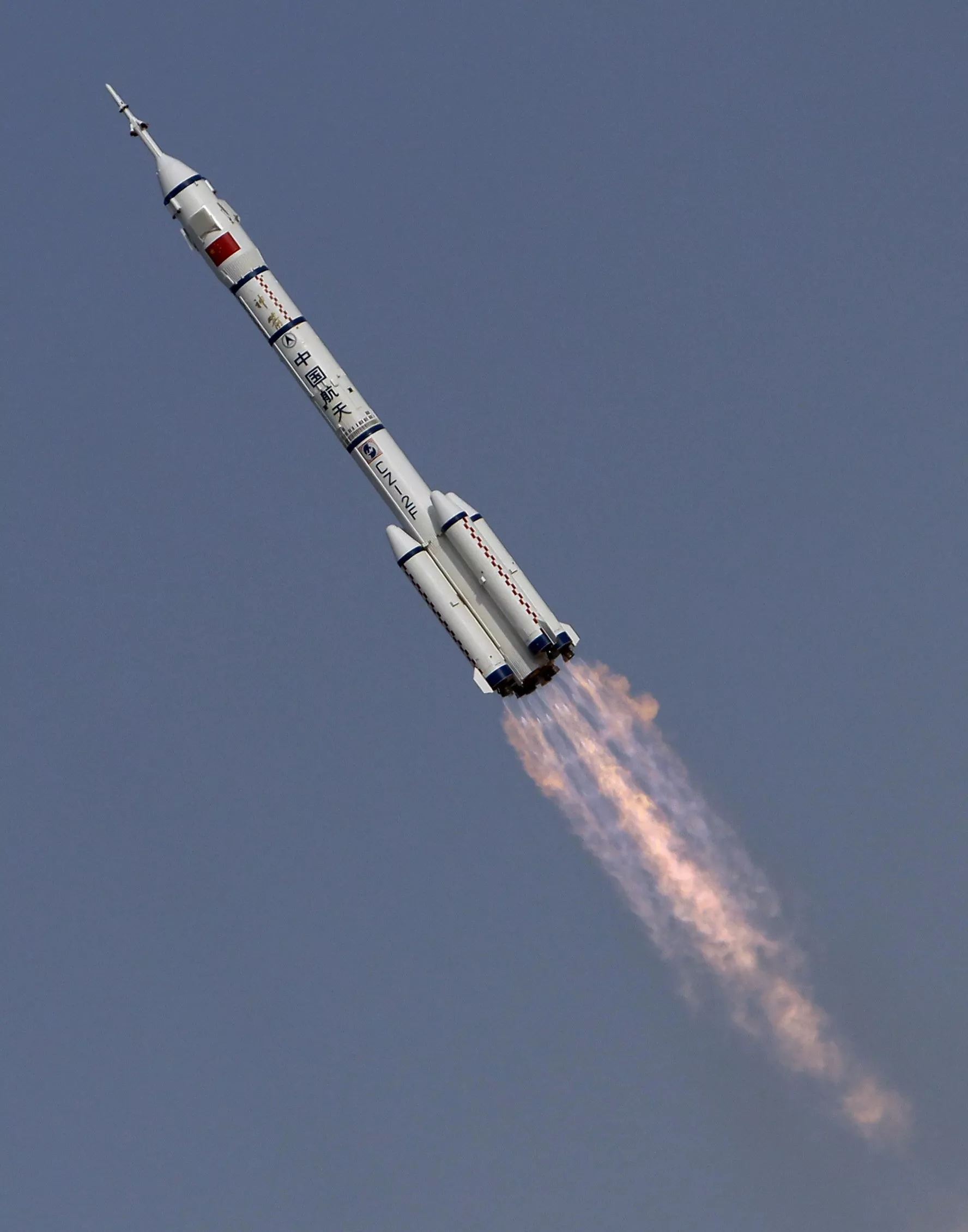 the long march ii f rocket loaded with shenzhou 9 manned spacecraft flies over the jiuquan satellite launch center in gansu province photo reuters the long march ii f rocket loaded with shenzhou 9 manned spacecraft flies over the jiuquan satellite launch center in gansu province photo reuters