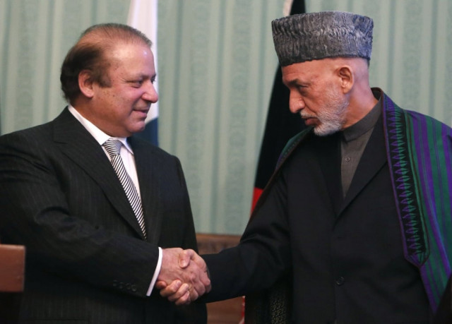 afghanistan 039 s president hamid karzai r shakes hands with prime minister nawaz sharif at a joint news conference in kabul photo reuters afghanistan 039 s president hamid karzai r shakes hands with prime minister nawaz sharif at a joint news conference in kabul photo reuters