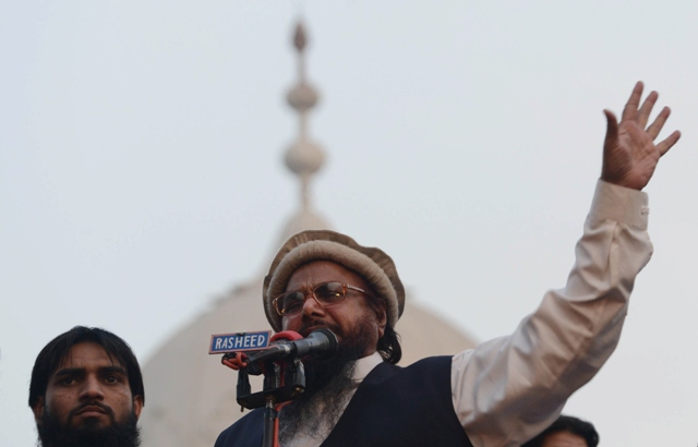 hafiz mohammad saeed head of banned pakistan charity organisation jamaat ud dawa jud addresses an anti us rally in lahore on december 1 2013 afp photo arif ali