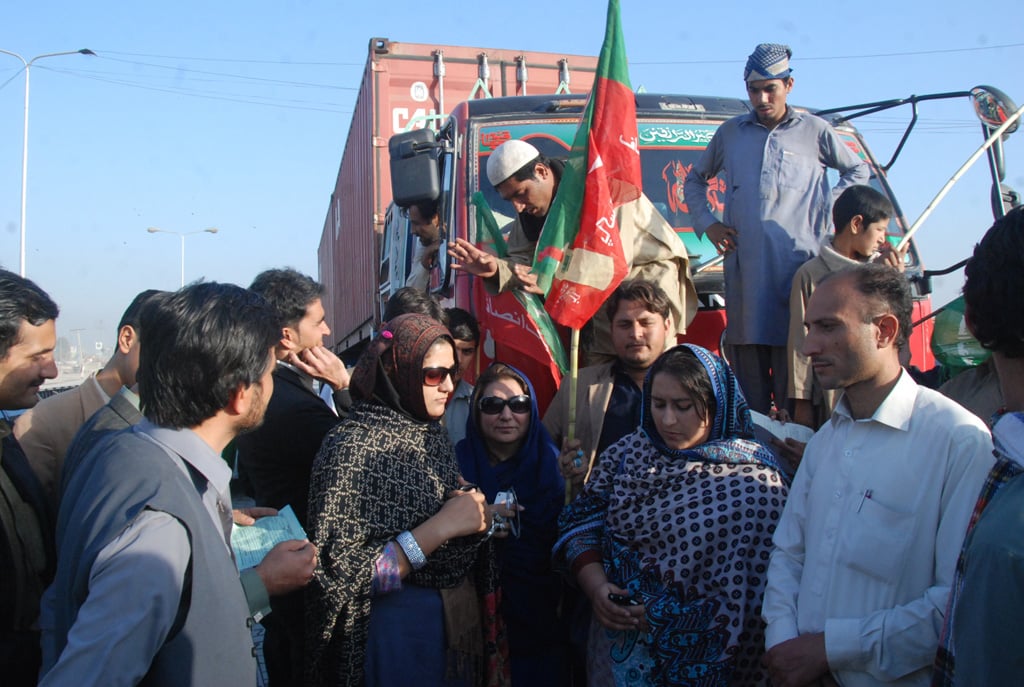 pti working checking the documents of the trucks photo sameer raziq express