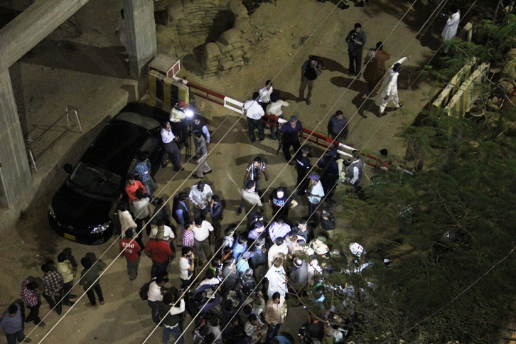 a crowd gathers at the front of the express news office after the attack photo ayesha mir express