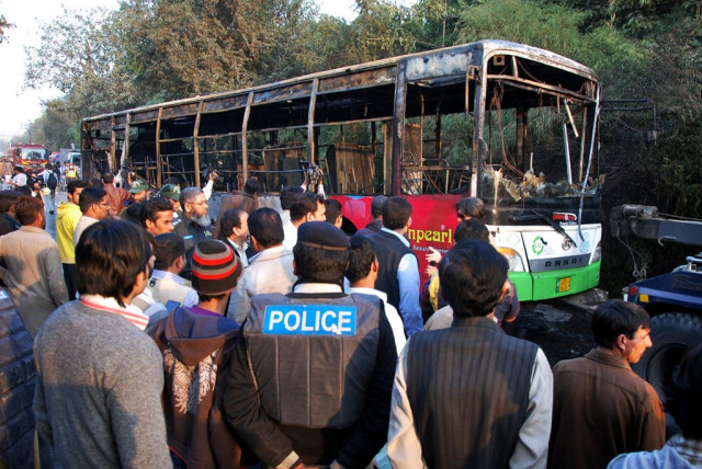 people gathered around the bus torched by the islami jamiat talaba ijt activists on monday in a protest at the punjab university s pu decision to convert a hostel for boys to one for girls photo shahbaz malik express people gathered around the bus torched by the islami jamiat talaba ijt activists on monday in a protest at the punjab university s pu decision to convert a hostel for boys to one for girls photo shahbaz malik express