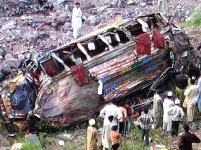 locals gather around the crashed bus photo express