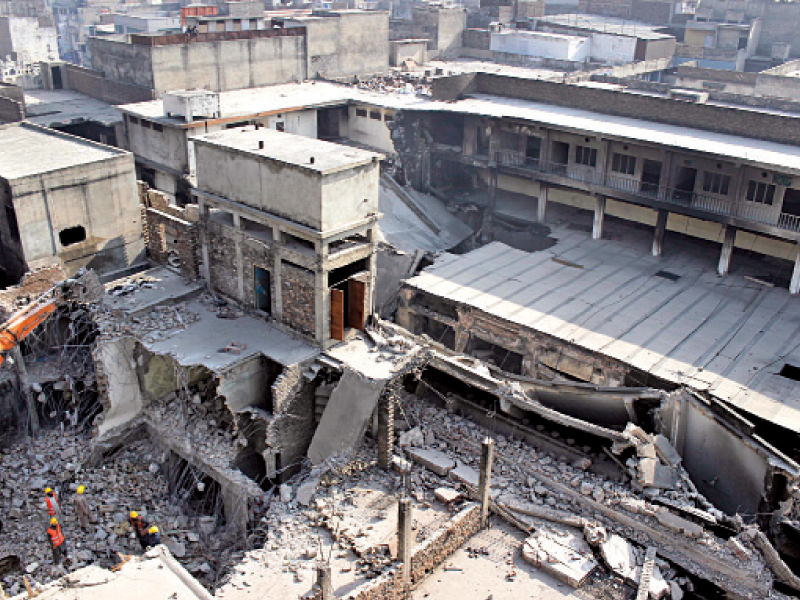 the damaged structure of madrassa taleem ul quran in rawalpindi being torn down a new building to house the madrassa will be built by the punjab government photo muhammad javaid express