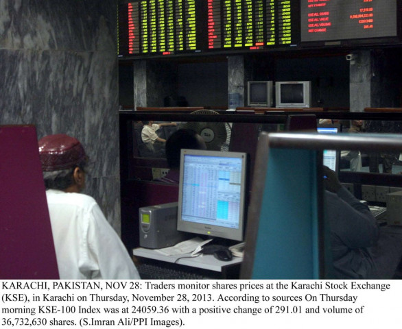 traders monitoring the shares prices at the karachi stock exchange on thursday november 28 2013 photo ppi file traders monitoring the shares prices at the karachi stock exchange on thursday november 28 2013 photo ppi file