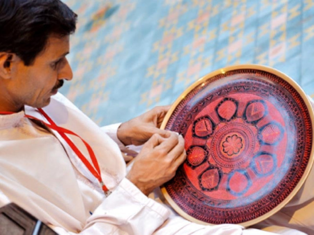waseem and other preparing some pieces while finished products are also pictured photo myra iqbal express waseem and other preparing some pieces while finished products are also pictured photo myra iqbal express