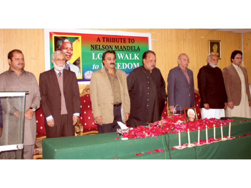 ajk premier and other government officials observe a moment of silence at national press club to pay homage to the late nelson mandela photo express