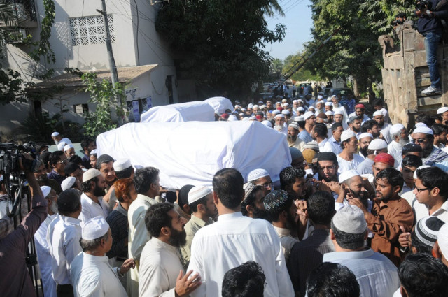 bodies of the three men shot dead late on friday bring brought for their funeral on saturday photo mohammad azeem express bodies of the three men shot dead late on friday bring brought for their funeral on saturday photo mohammad azeem express