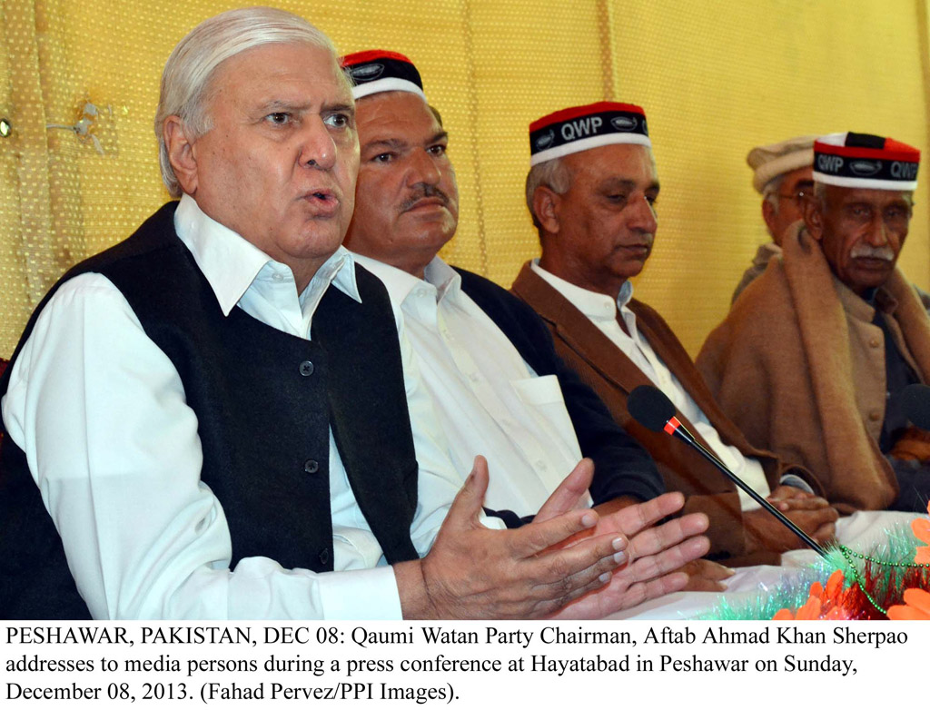 qwp chairman aftab ahmad khan sherpao addressing a gathering at the qwp central secretariat in hayatabad on december 08 2013 photo ppi