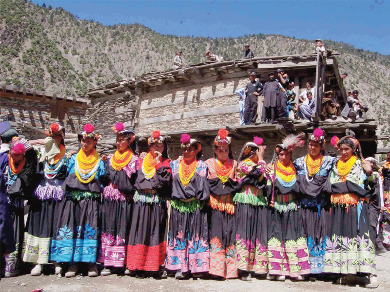 kalash women gather at the charsue a customary dancing ground in bumburet valley photo express