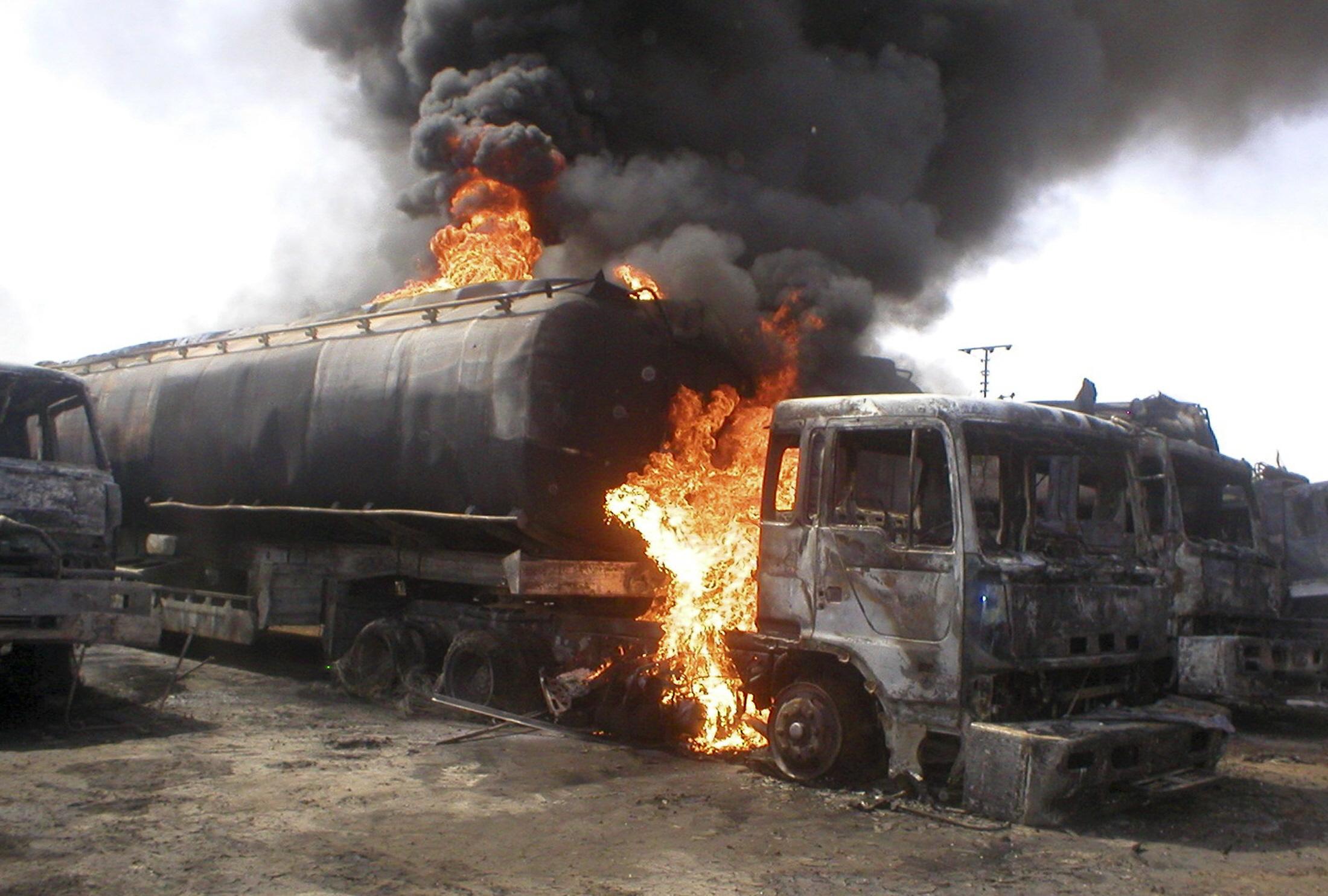 file photo shows a nato truck on fire in an attack in pakistan photo reuters file