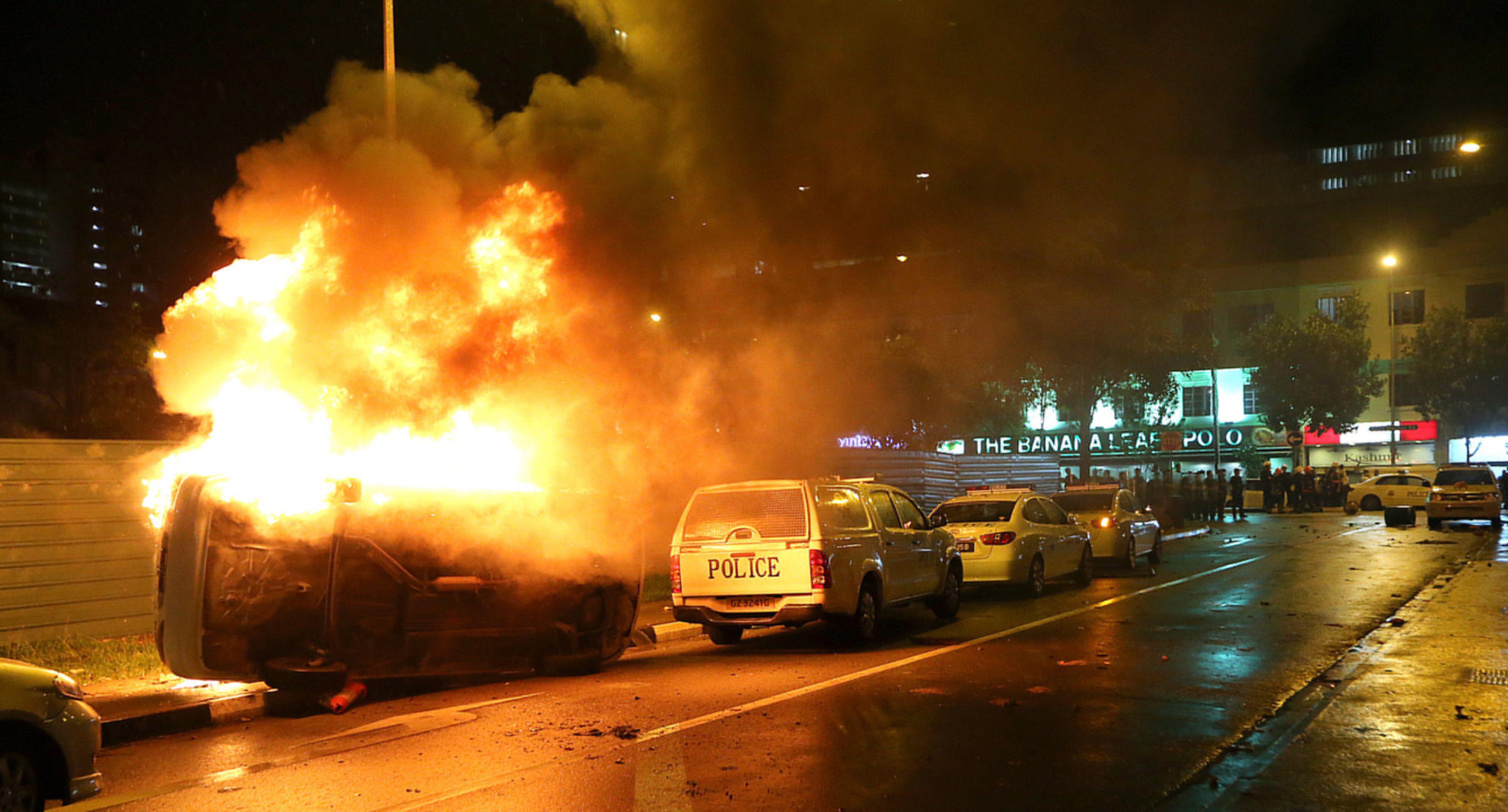 the death of an indian worker caused an outbreak of fierce rioting by south asian workers in little india singapore photo afp