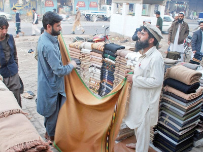 stay warm and carry on business turns cold as selling shawls becomes difficult stay warm and carry on business turns cold as selling shawls becomes difficult