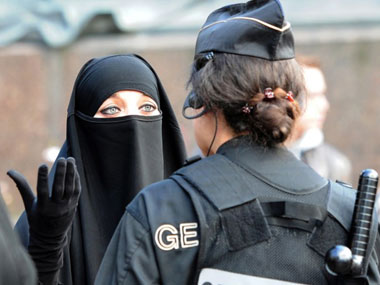 the arrest of a young woman in france for wearing a full face veil caused riots and led to a key trial shunning the ban photo afp