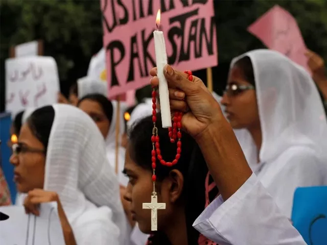 members of the pakistani christian community hold candles during a protest rally to condemn the suicide attack in peshawar on a church in lahore september 23 2013 photo reuters members of the pakistani christian community hold candles during a protest rally to condemn the suicide attack in peshawar on a church in lahore september 23 2013 photo reuters